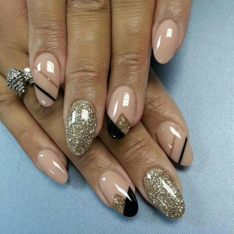 elegantes unhas de gel nageldesign ouro glitter nude preto