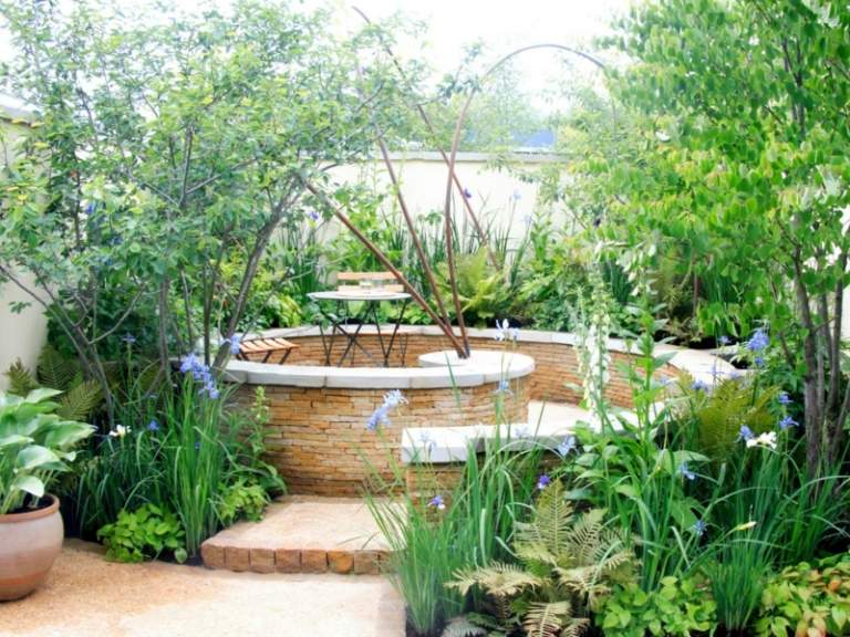 terraço em forma de jardim parede em espiral pedra graeser área de estar