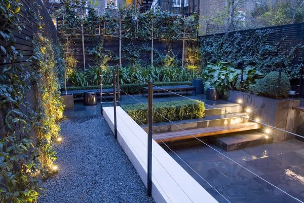 Iluminação indireta para jardins urbanos - piso de cascalho