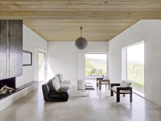 sala de estar casa minimalista moderna feita de madeira no lago de zurique