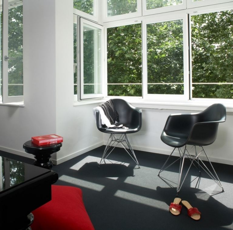 design-hotels-germany-ueberfluss-bremen-zimmer-black-white-eames-chair